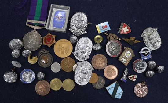 A collection of badges and medals including Fire Brigade and R.A.F.